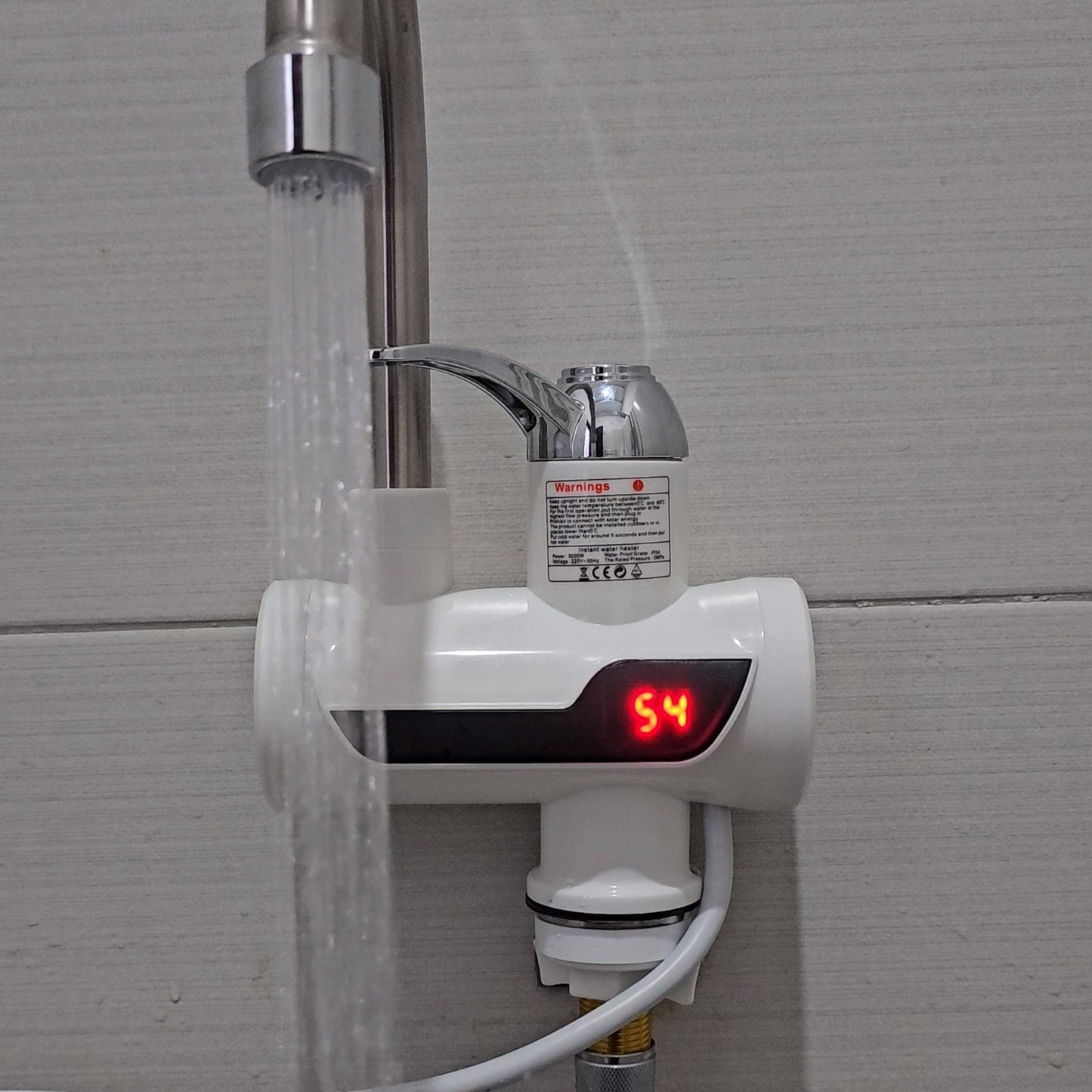 Instant electric water heater tap